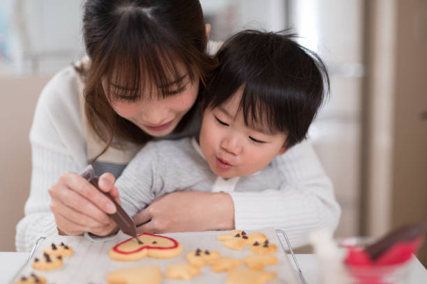 保育園送迎の準備をする主婦